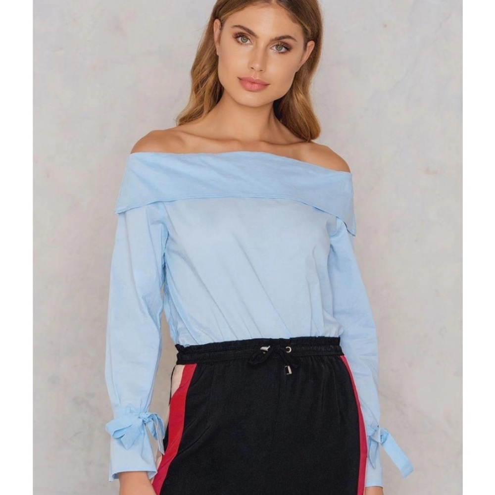 Lucca Large chambray off shoulder blouse with long sleeves and feminine bows.